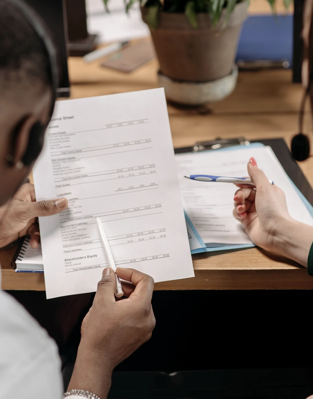 Financial documents being reviewed